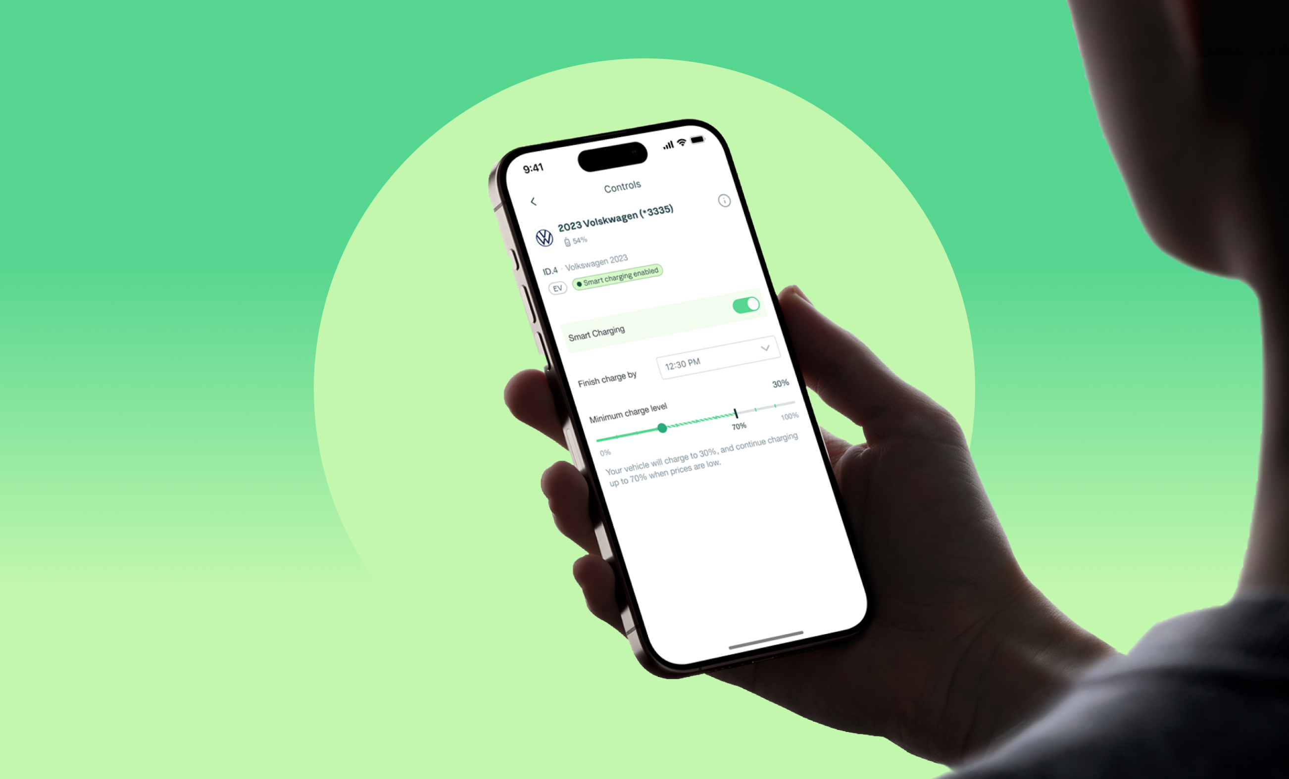 David Energy residential app — hand holding iPhone with smart EV charging controls on green background