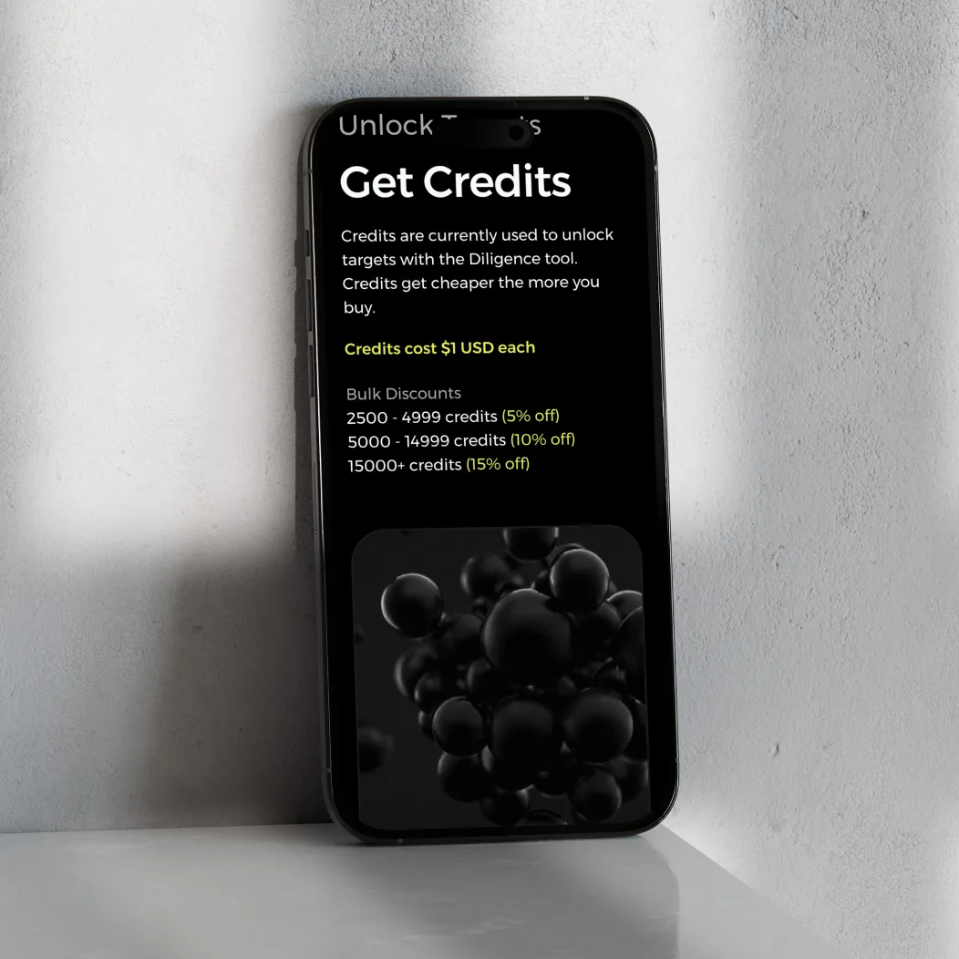 Om Therapeutics Get Credits screen — iPhone showing bulk discount tiers with molecular imagery