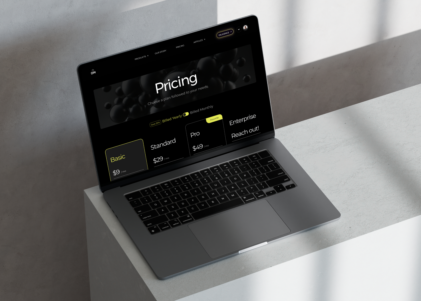 Om Therapeutics Pricing page on MacBook — Basic, Standard, Pro, and Enterprise tiers on dark background