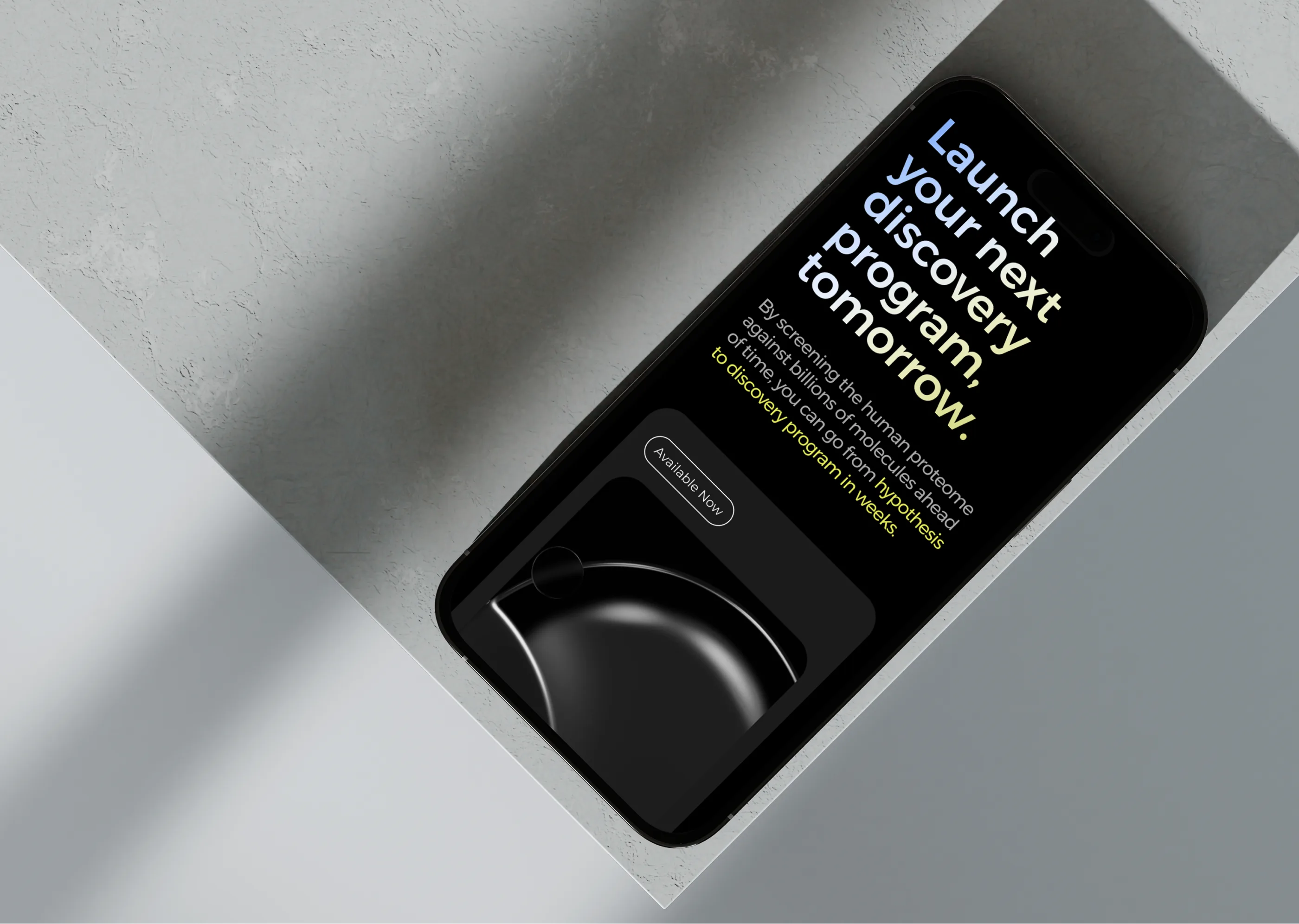 Om Therapeutics landing page hero — iPhone flat lay showing 'Launch your next discovery program. tomorrow.' on dark background