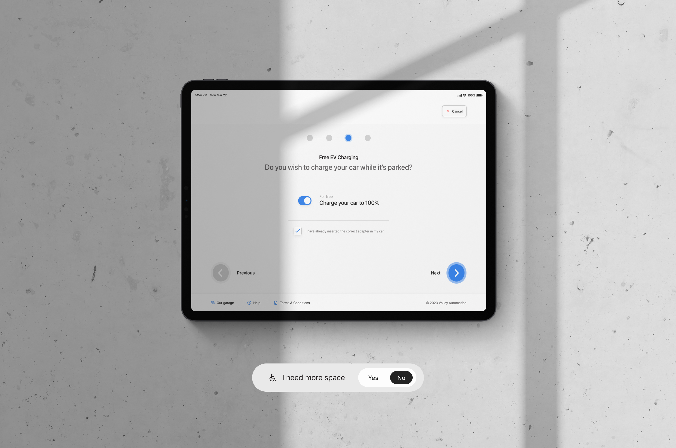 Kiosk EV charging step — iPad on concrete surface showing free EV charging opt-in with accessibility pill